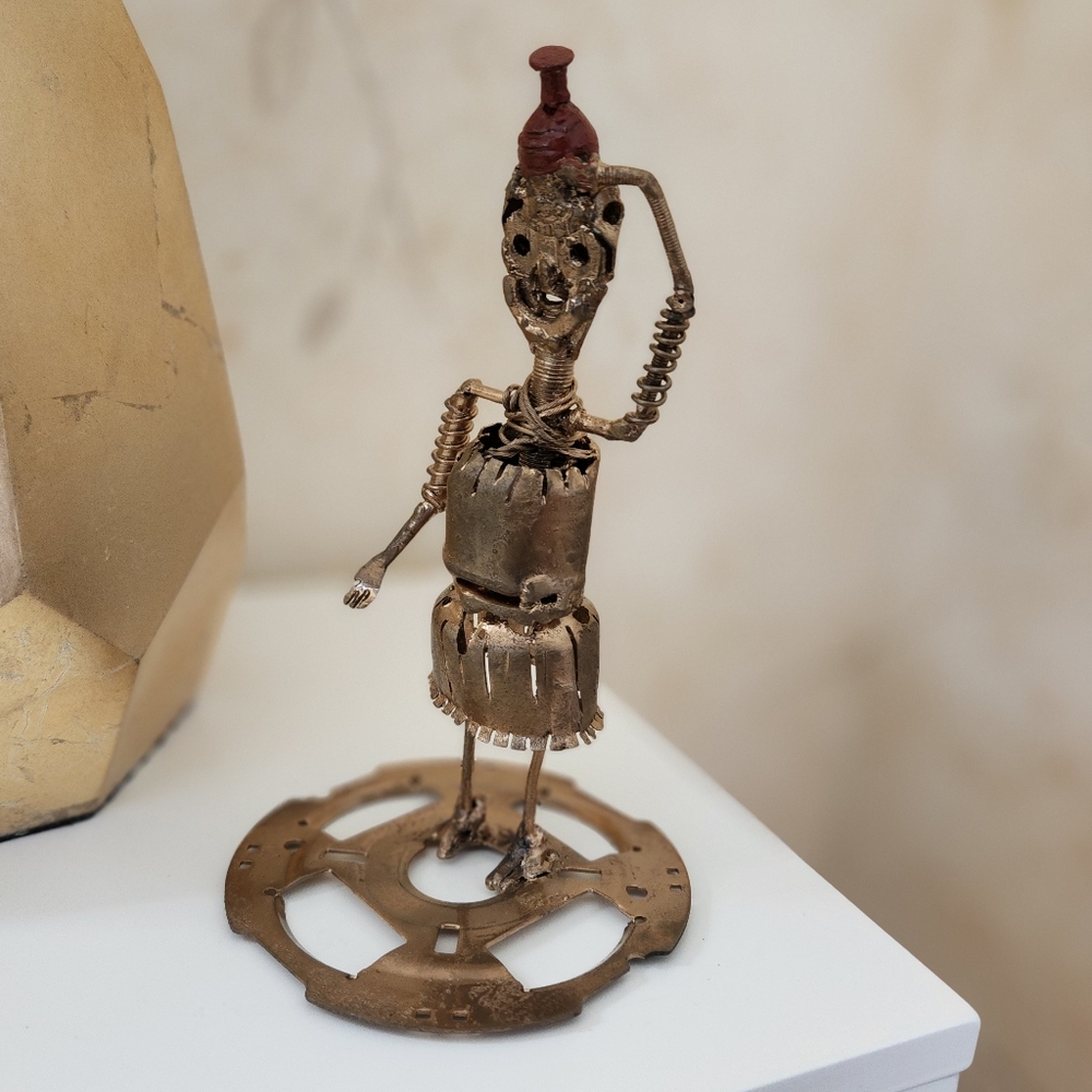 Handcrafted African Woman Sculpture – Recycled Metal Art
